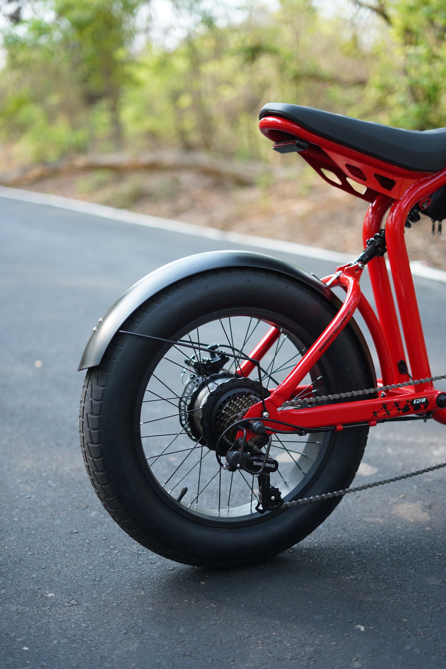 Detailed shot from the ExelMoto workshop showing components and assembly