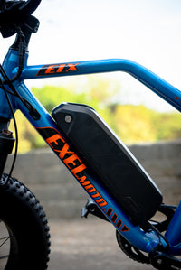 Rider in motion on Exelmoto electric bike