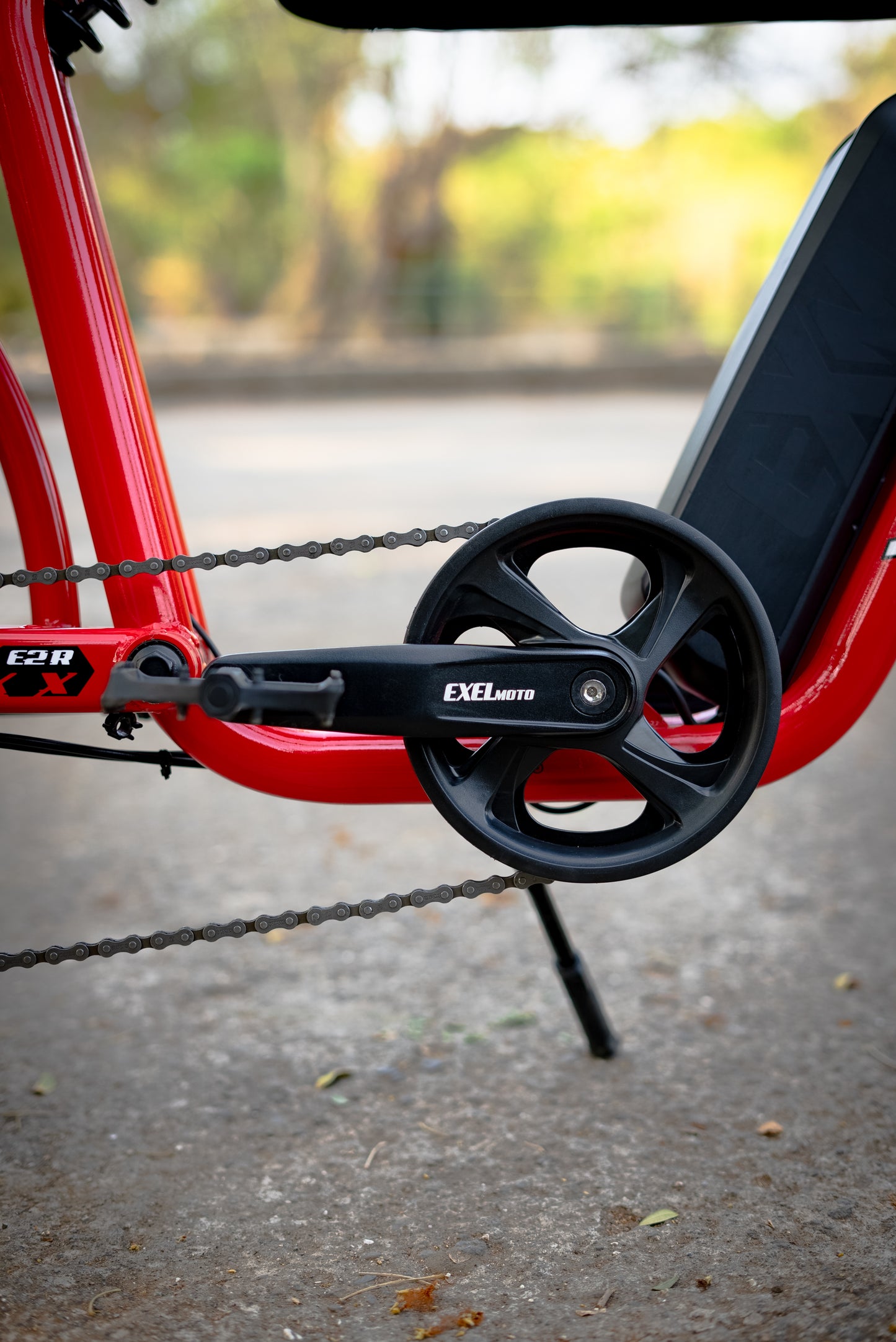 Close-up focusing on rear brake mechanism of ExelMoto E1X