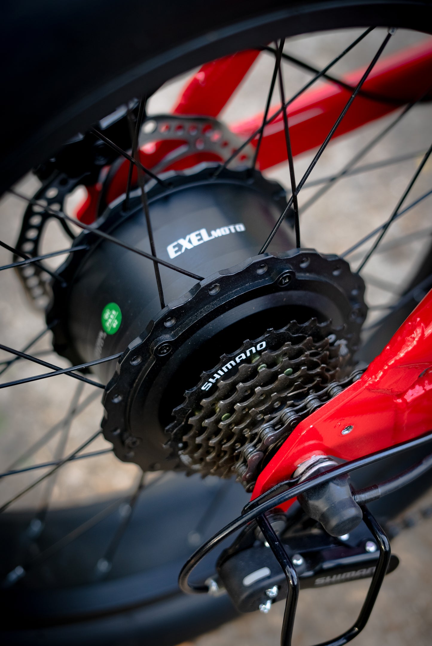 Photograph of ExelMoto E2R electric bike on display stand