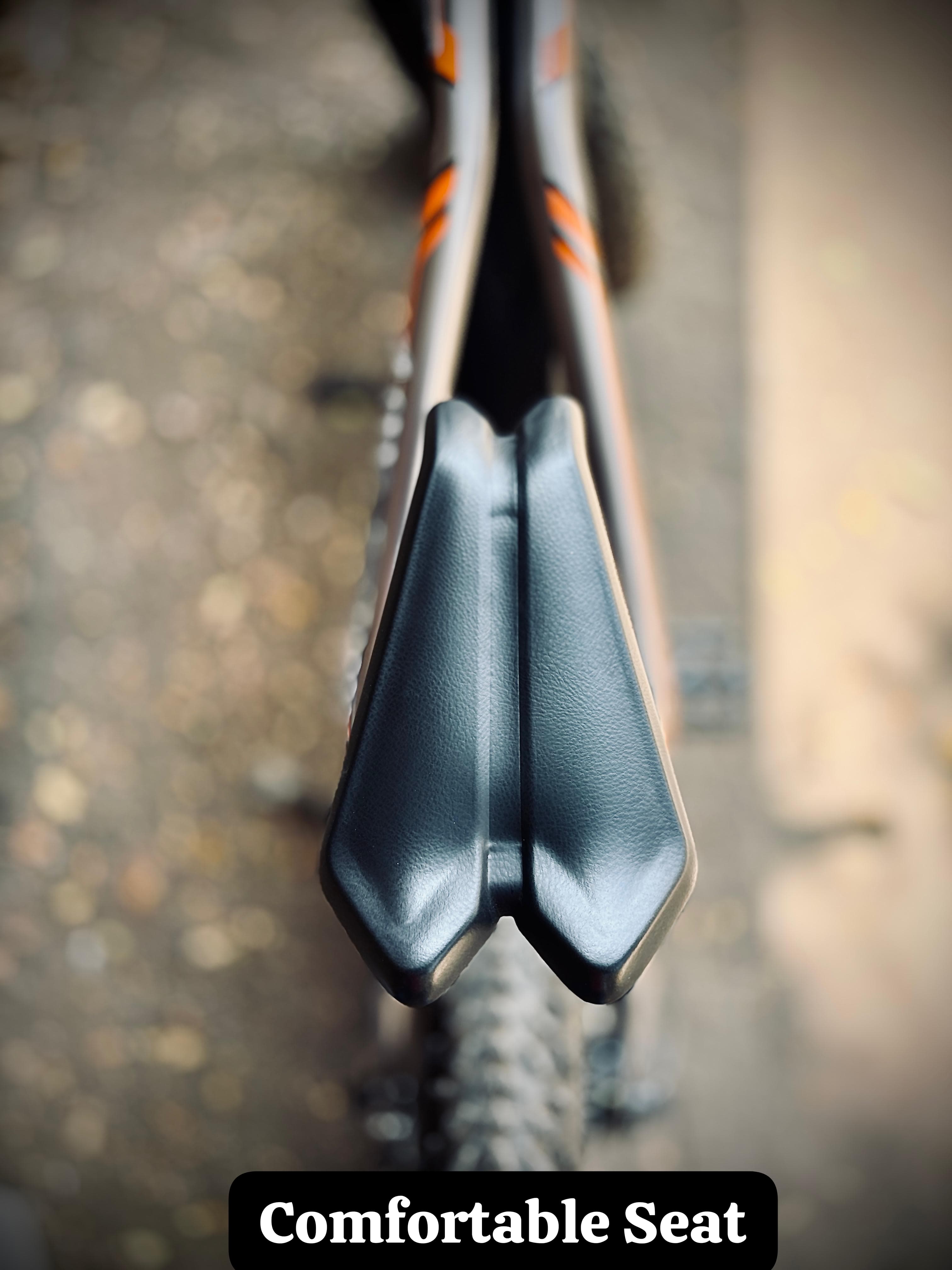 Close-up view of the pedal design on the ExelMoto E1X electric bike.
